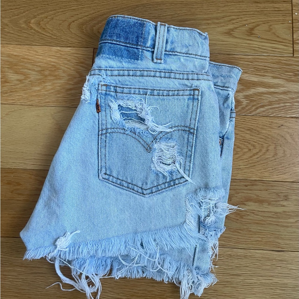 Vintage distressed Levi jeans 505 cut off shorts orange tab fits 25/26/27